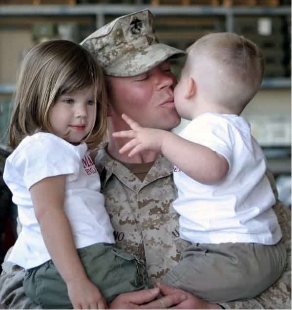 Photo of soldier with his two children